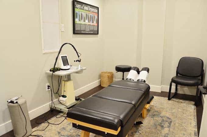 Chiropractic adjustment and Class IV laser therapy room at McAlpine Chiropractic, Holland MI