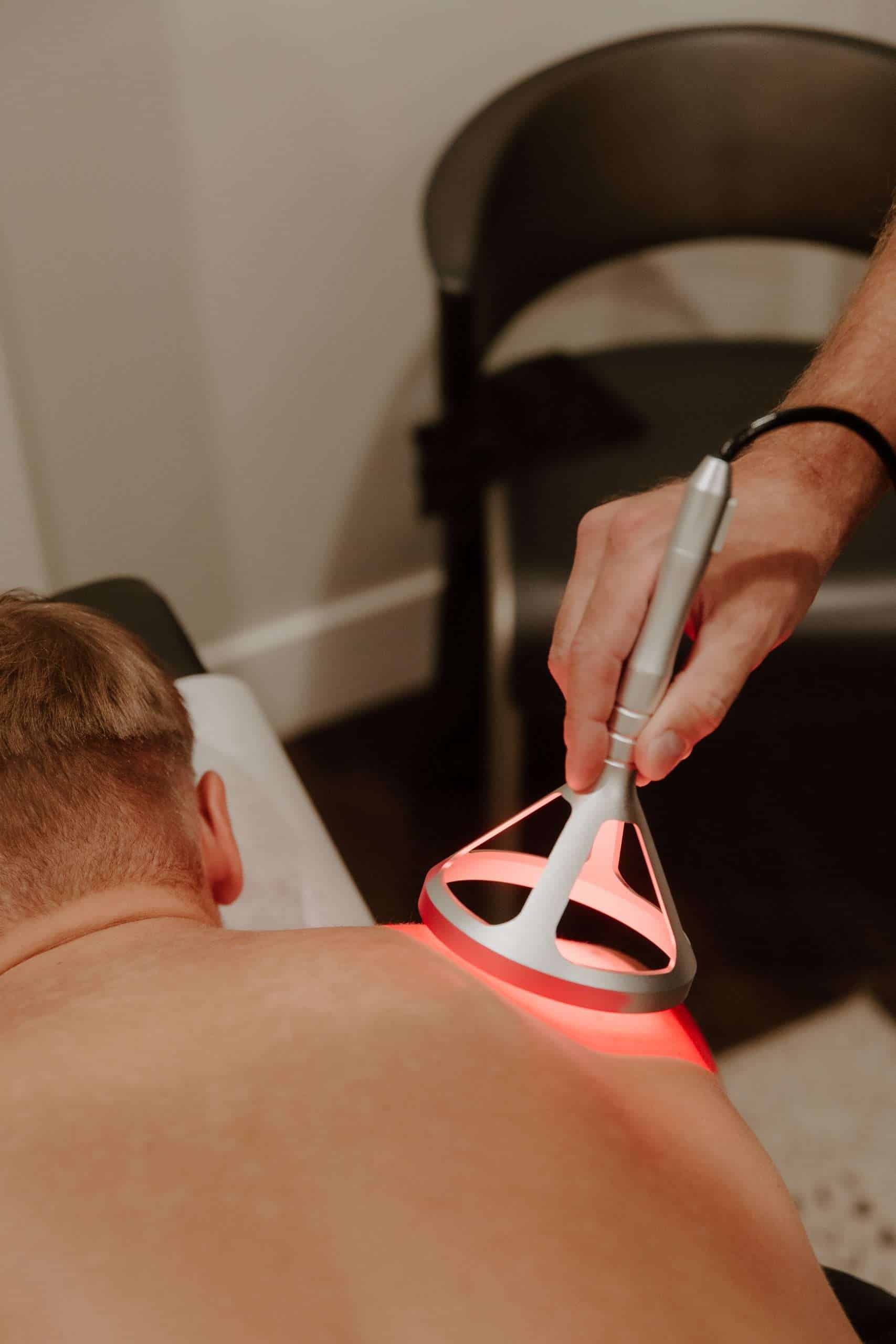 Class IV laser therapy treatment at McAlpine Chiropractic in Holland, MI